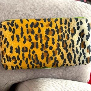Cheetah and lime green wallet.